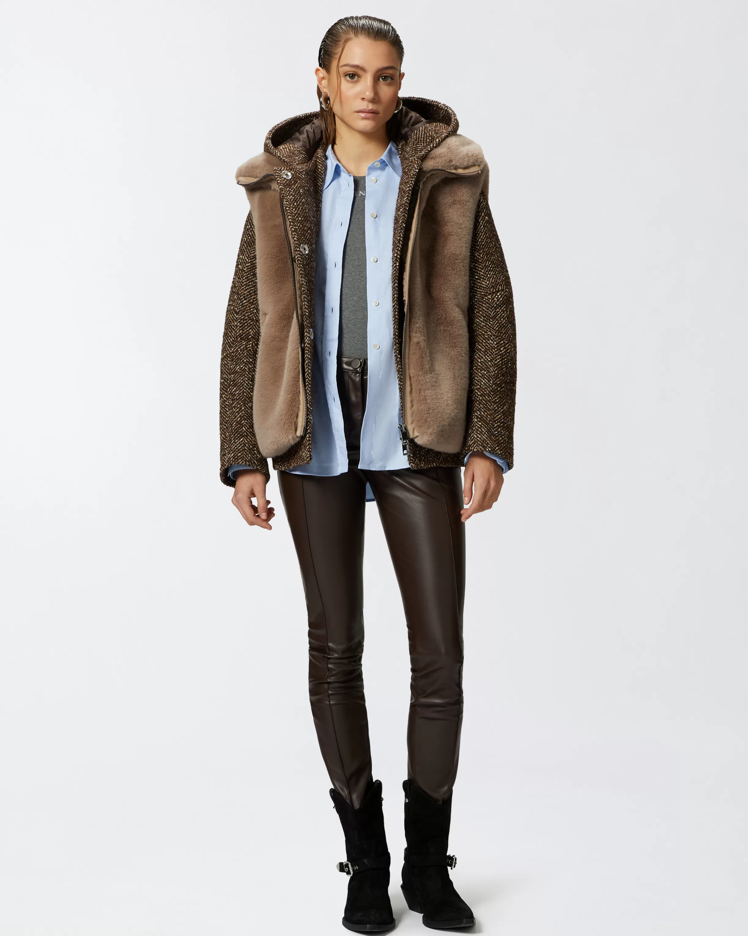 PINKO Sleeveless faux fur jacket with high collar.